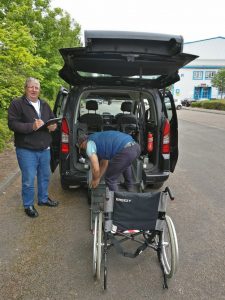 Attendee putting ramp in place